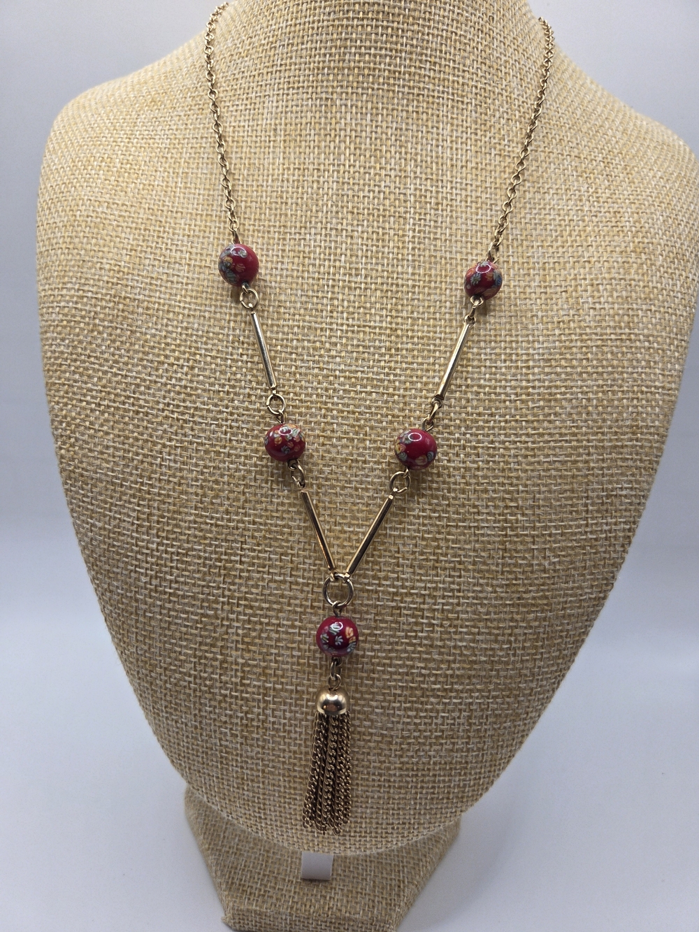 1732. Sarah Coventry Gold-Tone Necklace with Red Floral Beads and Tassel Pendant